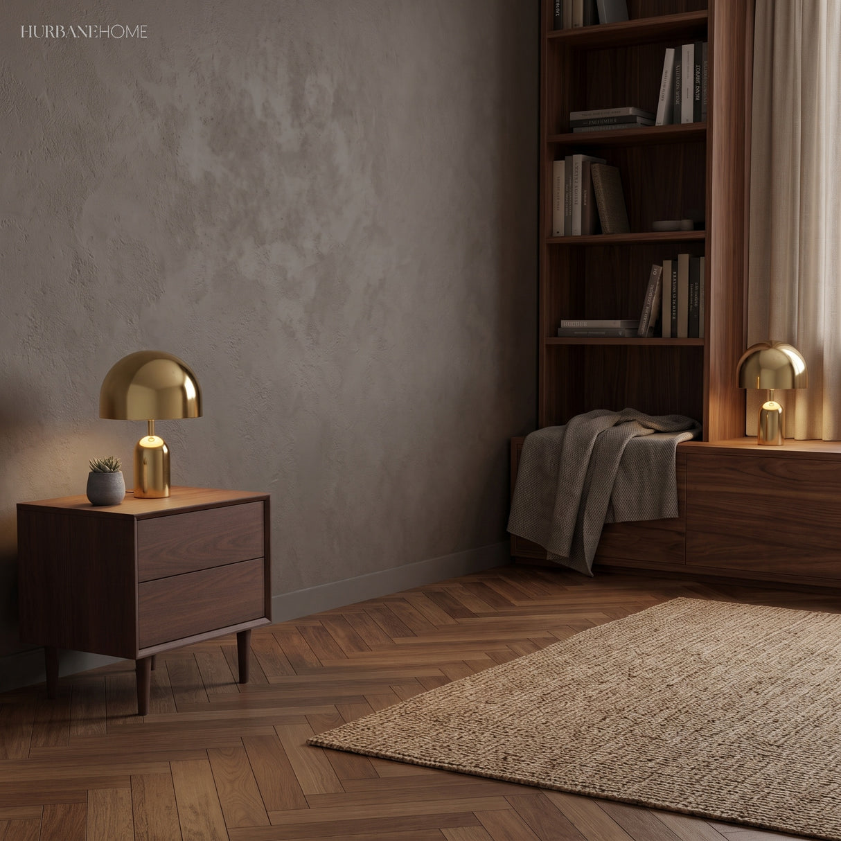 Gold dome table lamp on a walnut sideboard in a plain grey walled room