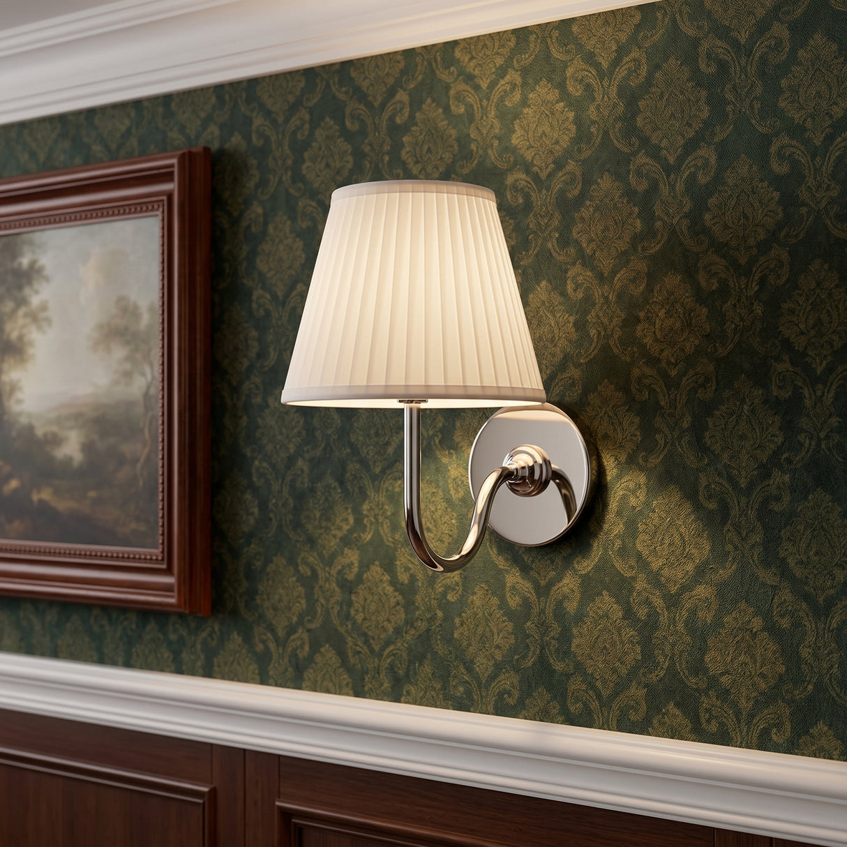 Polished chrome wall sconce with pleated white linen shade on patterned wall