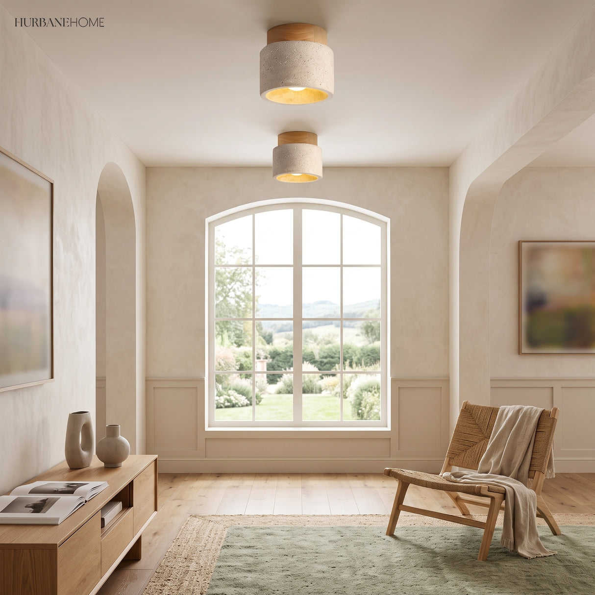 Two travertine ceiling lights in a bright room with arched windows
