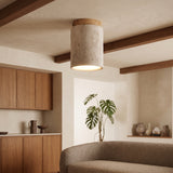 Travertine semi flush ceiling light with wood collar above a kitchen