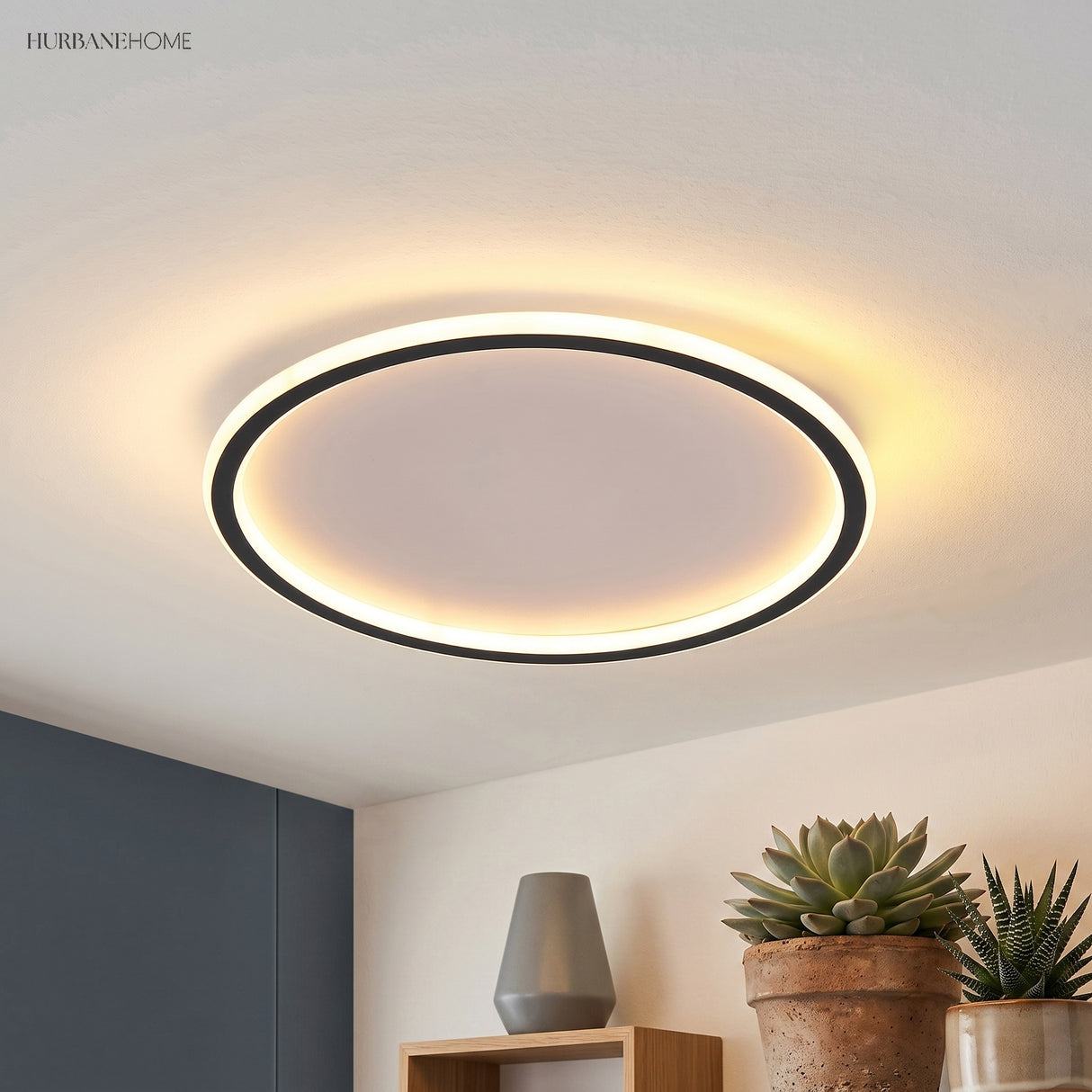 Ultra thin ceiling light above a corner with potted plants