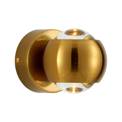 Close view of the gold orb sconce showing the split dome and open ends