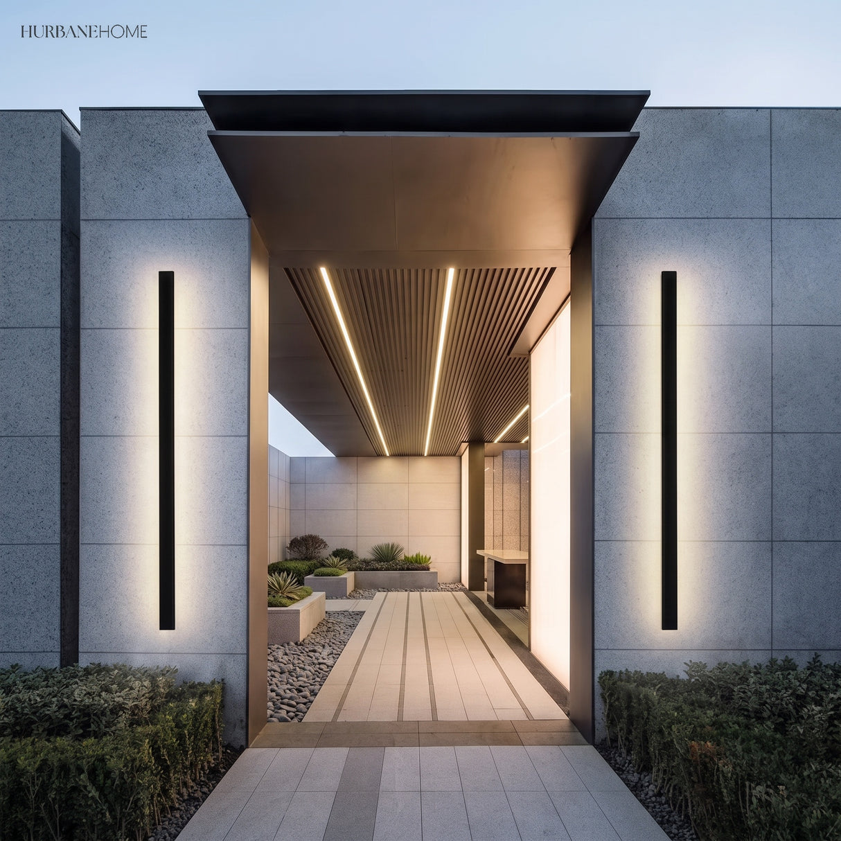 Linear LED wall lights flanking a covered modern entry walkway