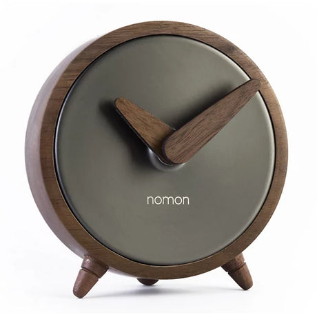 Vintage brass table clock on modern office desk