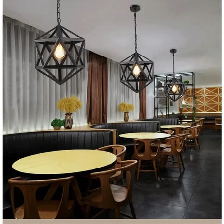 Vintage industrial metal pendant light installed above bar counter