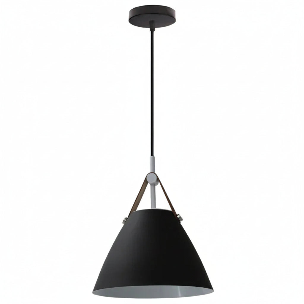 Vintage industrial metal pendant light in hotel room setting
