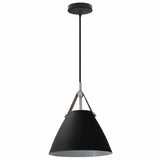 Vintage industrial metal pendant light in hotel room setting