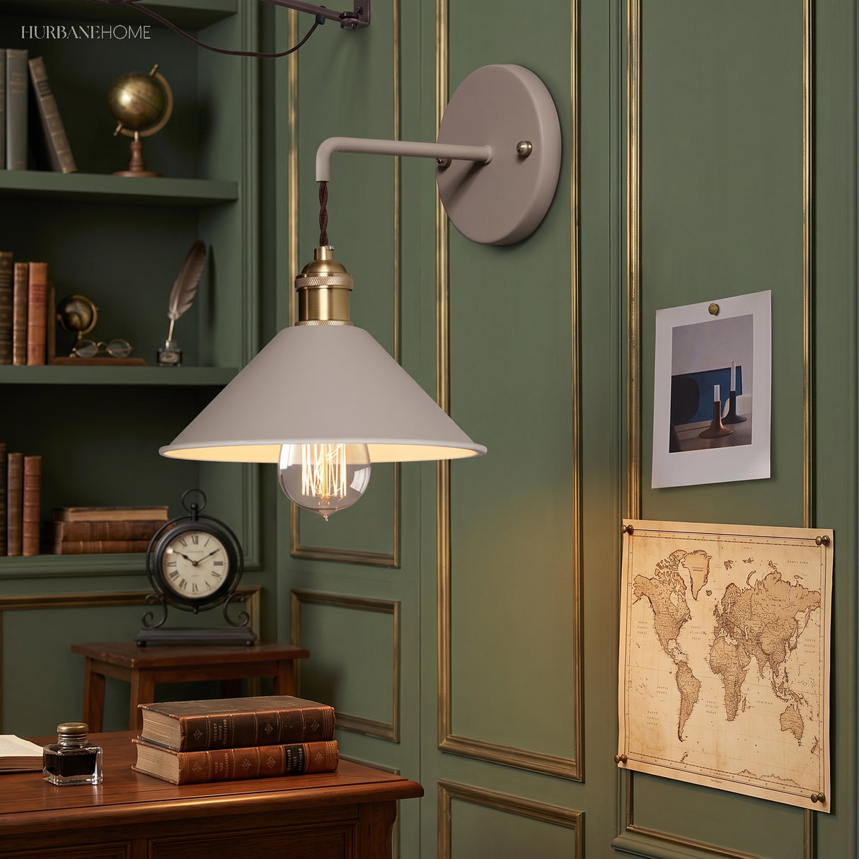 White cone shade sconce lit on a green panelled wall
