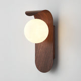 Wall sconce glowing to show even glare free frosted glass light