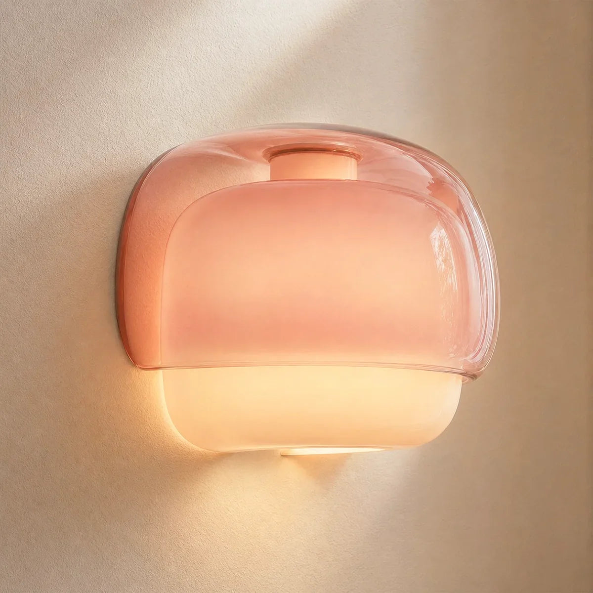 Wall sconce detail highlighting the opal diffuser band beneath the coloured glass
