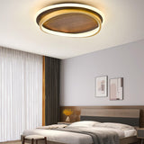 Walnut grain flush mount ceiling light shown against a grey background
