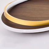 Walnut grain ceiling light lit to show the glowing acrylic edge