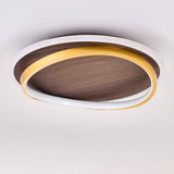 Underside view of the round walnut and gold ceiling light