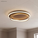 Walnut grain LED ceiling light styled in a warm modern interior
