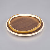 Walnut grain round LED flush mount ceiling light, studio product photo