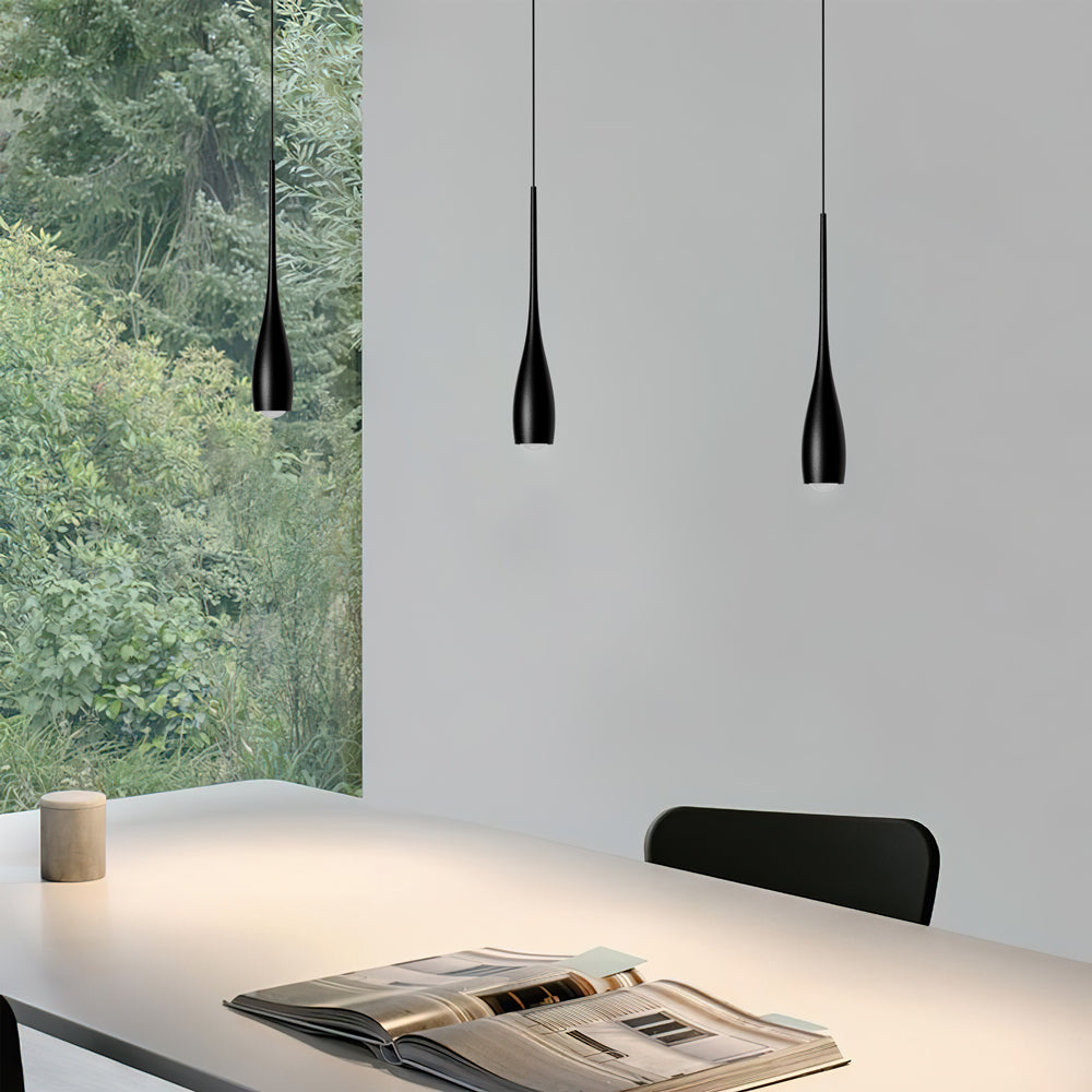Aluminium water drop pendant light illuminating a contemporary space