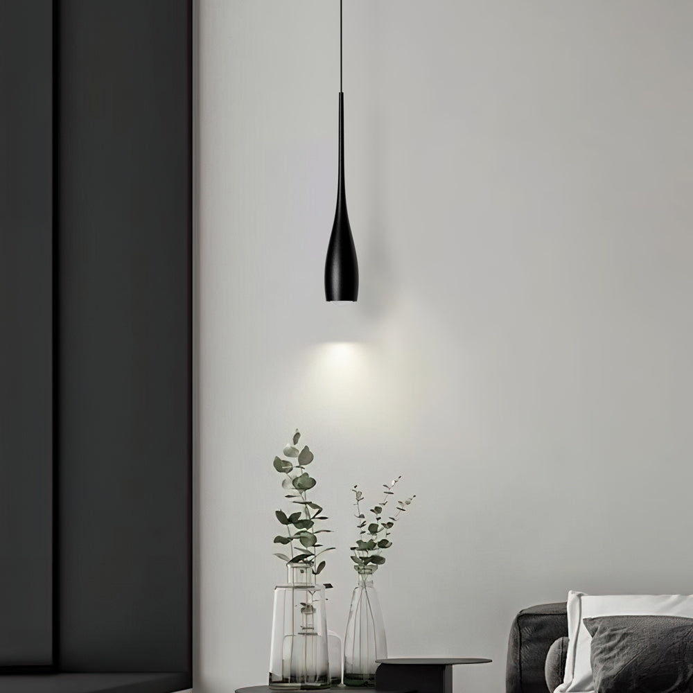 Minimalist pendant light with rounded drop shade and warm glow