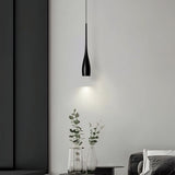 Minimalist pendant light with rounded drop shade and warm glow