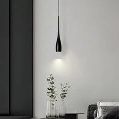 Minimalist pendant light with rounded drop shade and warm glow