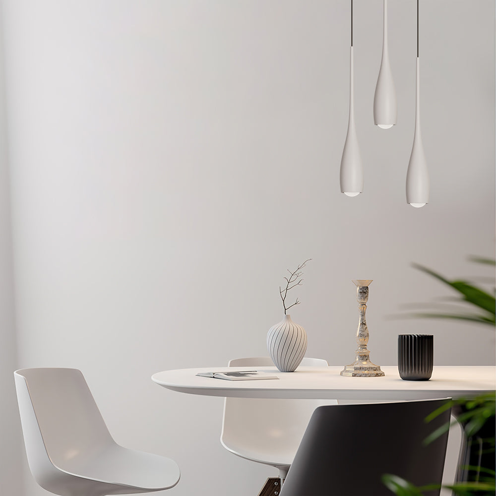 Water drop pendant light shown lit against a neutral interior backdrop