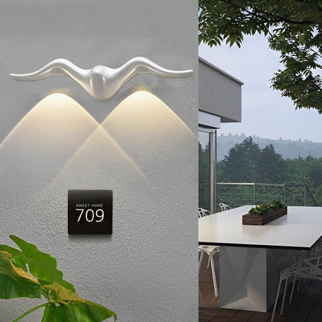 Animal shaped outdoor LED wall light detail view 4 showing finish and construction