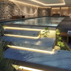 LED strip following a winding garden path beside planting and stone
