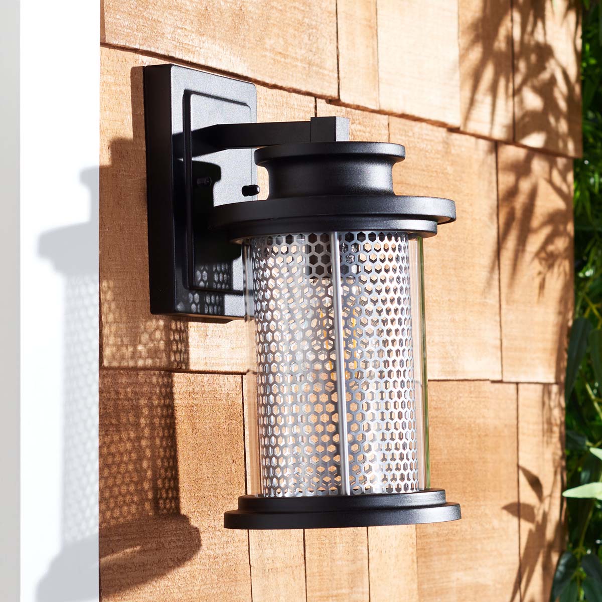 Sleek weatherproof outdoor wall lights illuminating patio entrance