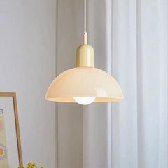 White shade bowl pendant light with a coloured metal cap swatch