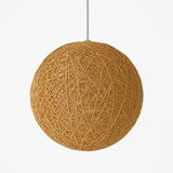 Tan woven globe pendant on a white cord