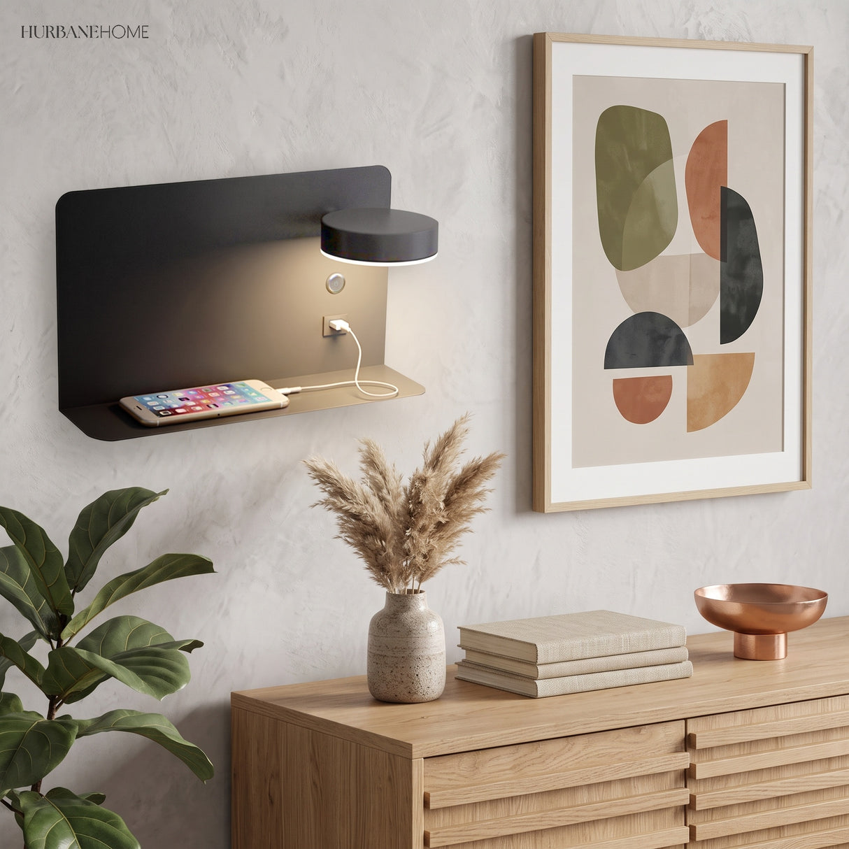 Black rotating wall lamp beside a bed with warm reading light