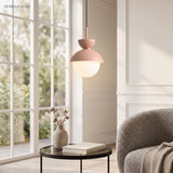 Macaron Dome Pendant Light with Frosted Glass Globe in a modern interior