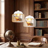 Clear Glass Pendant Light with Animal Figures in a modern interior