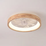 Round solid wood flush mount ceiling fan light on a plain wall