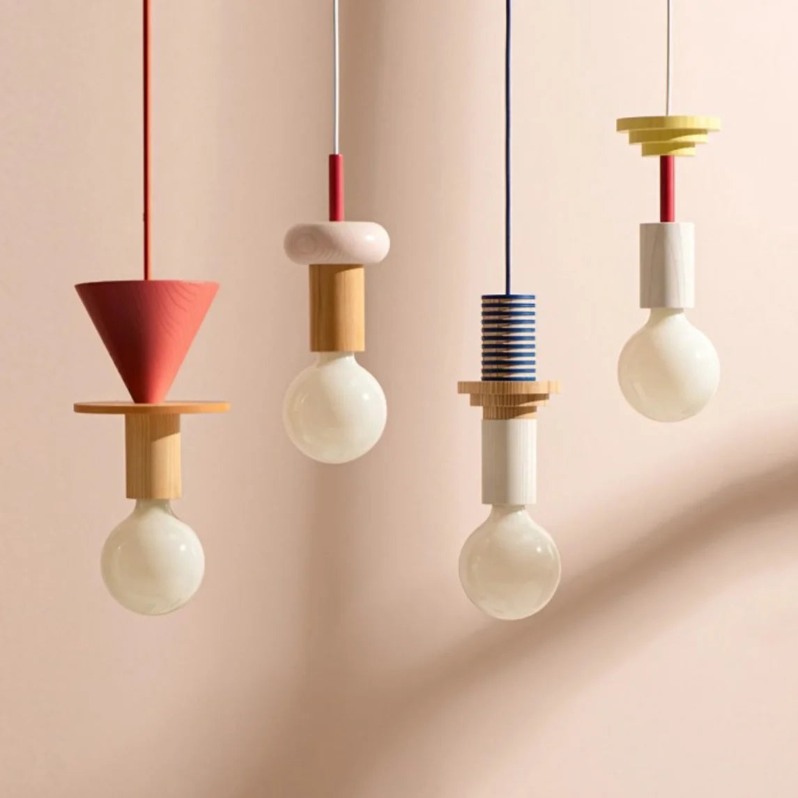 Colorful geometric wood pendant light lighting a cozy home reading nook