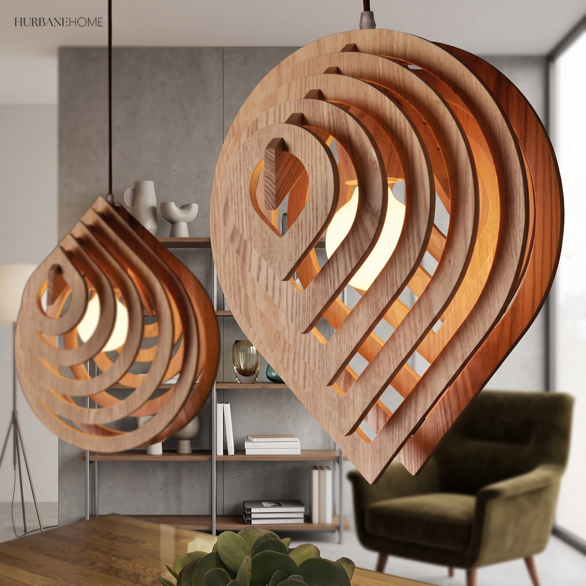 Two wood teardrop pendants at different heights in a living room