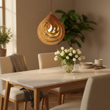 Wood teardrop pendant seen at an angle with light through the gaps