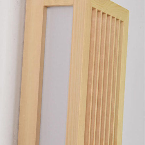 Detail of the light wood frame, slats and acrylic diffuser panel unlit
